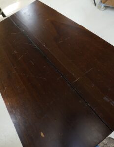Donkere houten klaptafel met X-poten – foto 5